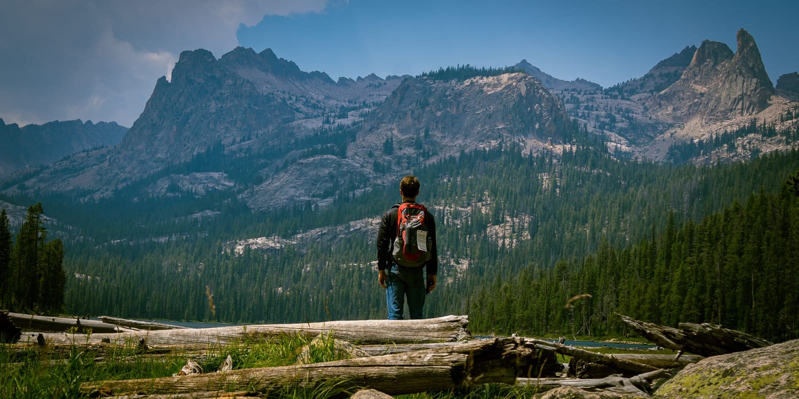 Hiker below the Sawtooth peaks