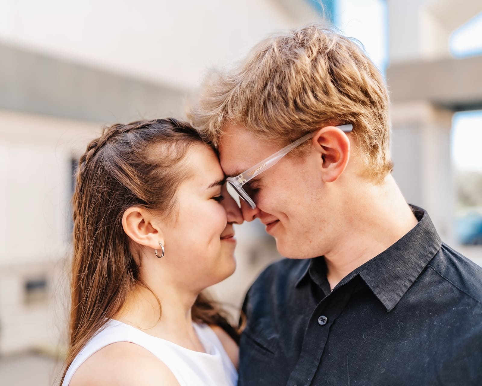 Couple resting their foreheads together
